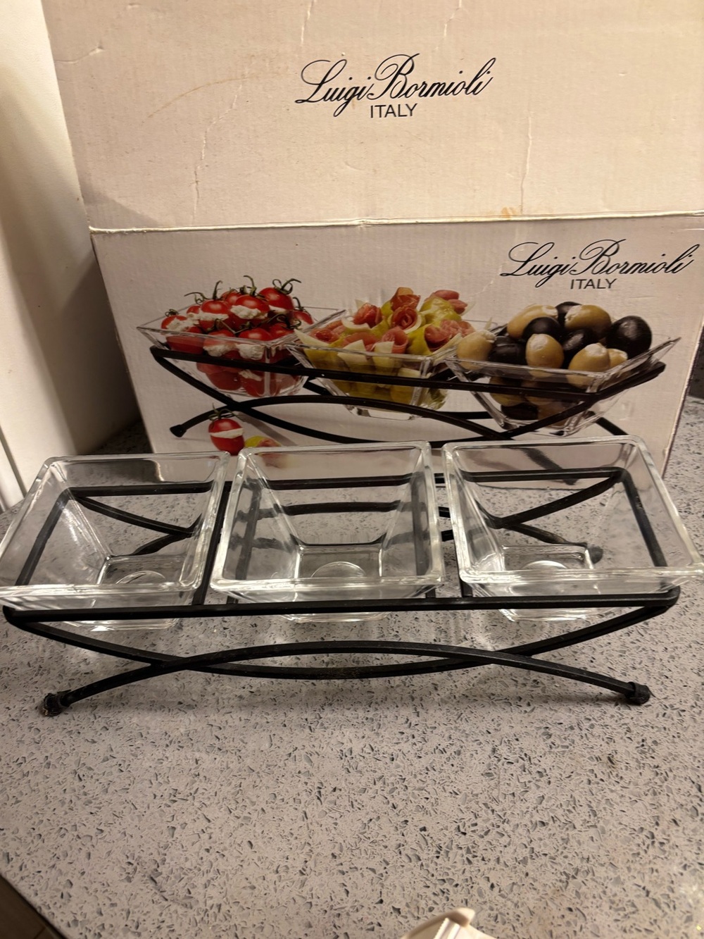 Bormioli
Luigi Bormioli Italy iron stand with serving dishes.